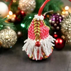 : Entdecken Sie 7 cm große Weihnachtswichtel mit befüllbarem Anhänger in rot für einzigartige Geschenke Baumschmuck
