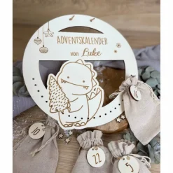 Outlet Adventskalender personalisiert mit Namen Dino rund / Weihnachtskalender Advent zum befüllen Adventskalender