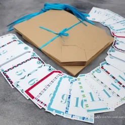 Discount Adventskalender zum Befüllen – 24 Kraftpapiertüten mit Zahlenanhängern & Satinbändern Adventskalender