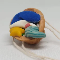 Baumschmuck|Danielas IdeenReich Baumschmuck Walnussschale Schaukelbettchen mit kleinem schlafend Wichtel mit nachtleuchtender Zipfelmütze und Stern