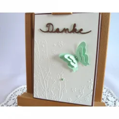 New Dankekarte mit Hintergrundprägung und Schmetterling Dankeskarten