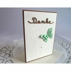 New Dankekarte mit Hintergrundprägung und Schmetterling Dankeskarten