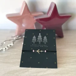 Weihnachtskarten|UtosaDesign Filigranes Armband in Schwarz mit Anker-Element in Silber, Glasschliffperlen in Rosa und Weihnachtskarte