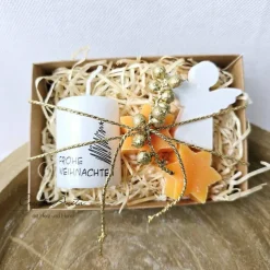 Outlet Geschenk zu Weihnachten - Weihnachtskerze mit Seifensterne Orange und kleinem Schutzengel Weihnachtsgeschenke