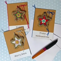 Discount Grußkarte Weihnachten glitzernder Stern gehäkelt mit Wunschtext Weihnachtskarten