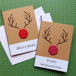 Discount Grußkarte Weihnachten Rentier Rudolph the Red-Nosed Reindeer gehäkelt und gestickt mit Wunschtext Weihnachtskarten