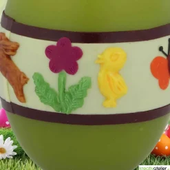 Hot Ostereikerze in grün mit fröhlich-buntem Osterreigen verziert  Ostergeschenk Osterkerze Osterdeko Osterkerzen