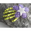 Accessoires|Punkrockdesign Skeletthand Haarklammer Stern polka dots