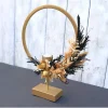 Discount Tisch Gesteck Trockenblumendeko Ringgesteck Tischloop Kreisgesteck goldfarbig schwarz Tischdekoration
