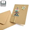 Weihnachtskarten|Buchbinderei Frühauf Weihnachtskarte mit Papierdrahtfiguren Tannenbaum und Stern